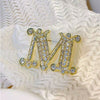 Brooch "M"