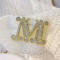 Brooch "M"