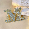 Brooch "M"