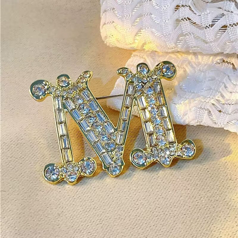 Brooch "M"