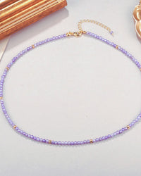 Chaîne cristal lilas avec perles dorées 18 carats